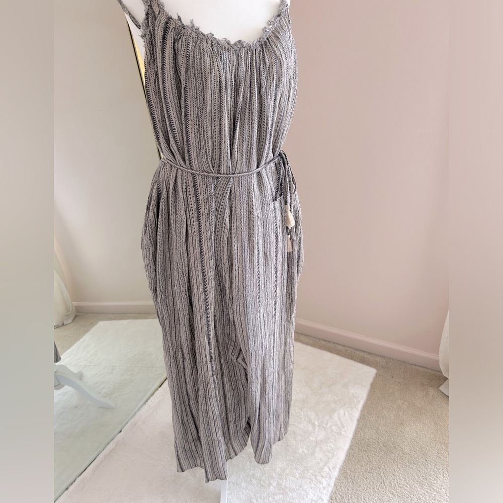 Jumper wide legged gaucho/palazzos style. Size small to medium. Stripped pattern